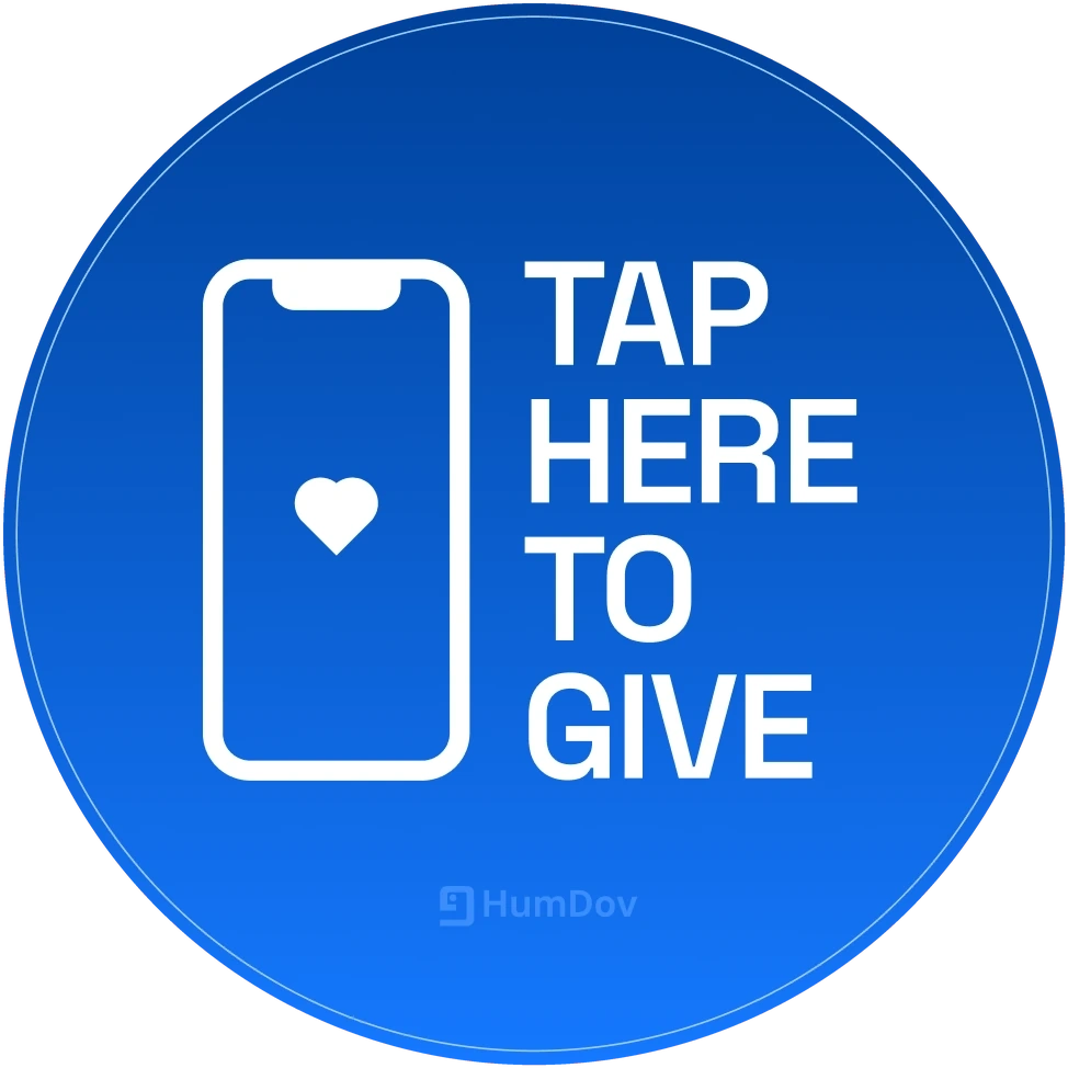 A round blue HumDov plate that says Tap here to give