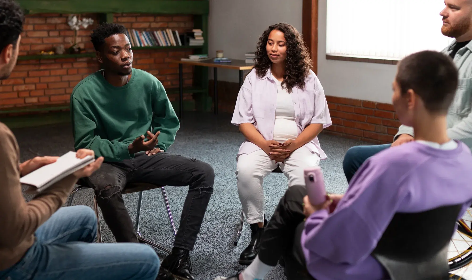 A faith community seated in a circle for an open discussion